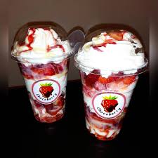 Foto detalle de fresas con crema